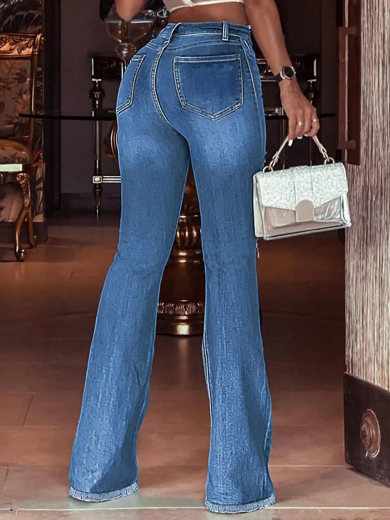 The latest retro denim street style in the 21st century, with a millennial style street look. Women's ripped flared washed retro